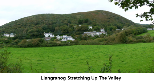 Llangranog stretching up the valley.