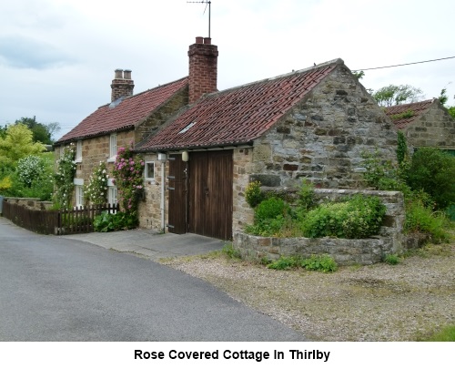 Rose covered cottage in Thirlby