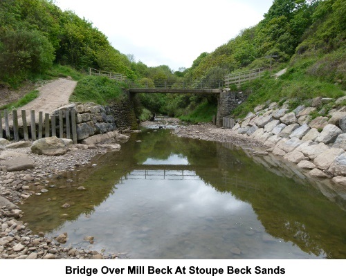 The bridge over Mill Beck at Stoupe Beck Sands.