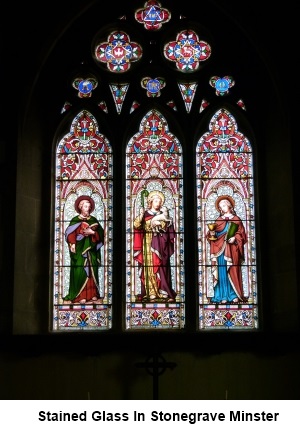 Stained glass window in Stonegrave Minster