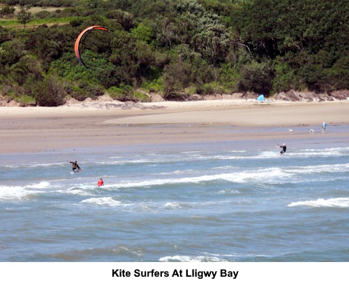 Kite surfers at Lligwy Bay.