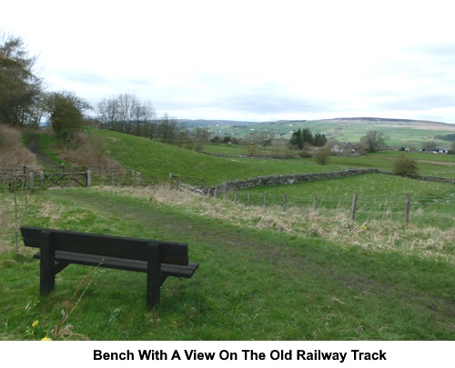 A bench with a view on the old railway track.