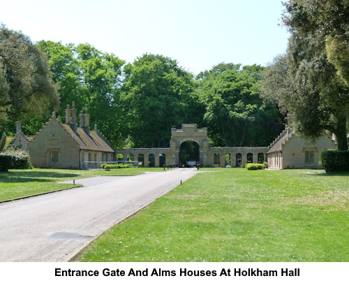 Entrance gate and alms houses at Holkham Hall.