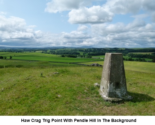 Haw Crag trig. point with Pendle Hill in the background