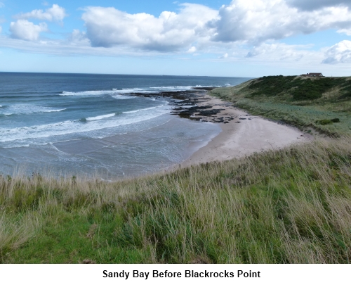 A sandy bay just before Blackrocks Point.