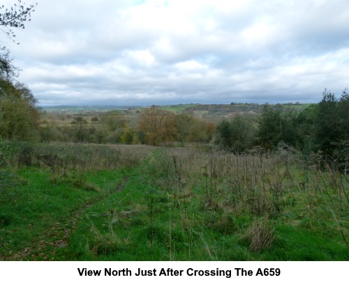 View north just after crossing the A659.