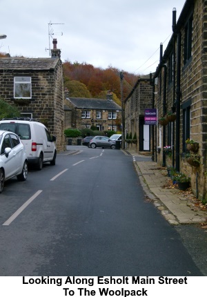 Looking along the main street in Esholt, towards the Woolpack pub.